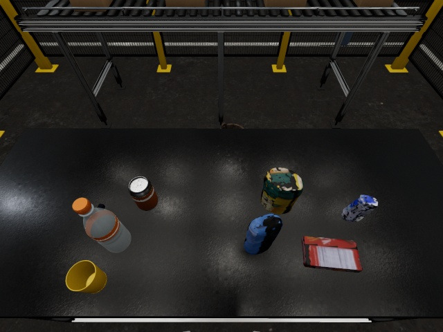 Head camera: the table from above, the blue bottle, the soup-mix tin and other objects